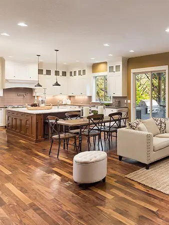 Vilchis Hardwood Floors team finishing a hardwood floor in Durham NC